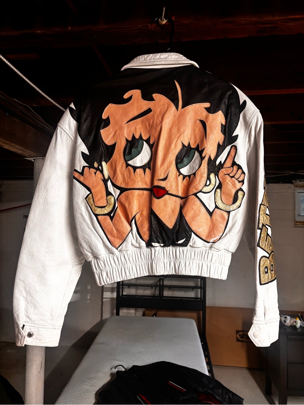 bebe White Leather Bomber Jacket with Peach Graphic Back